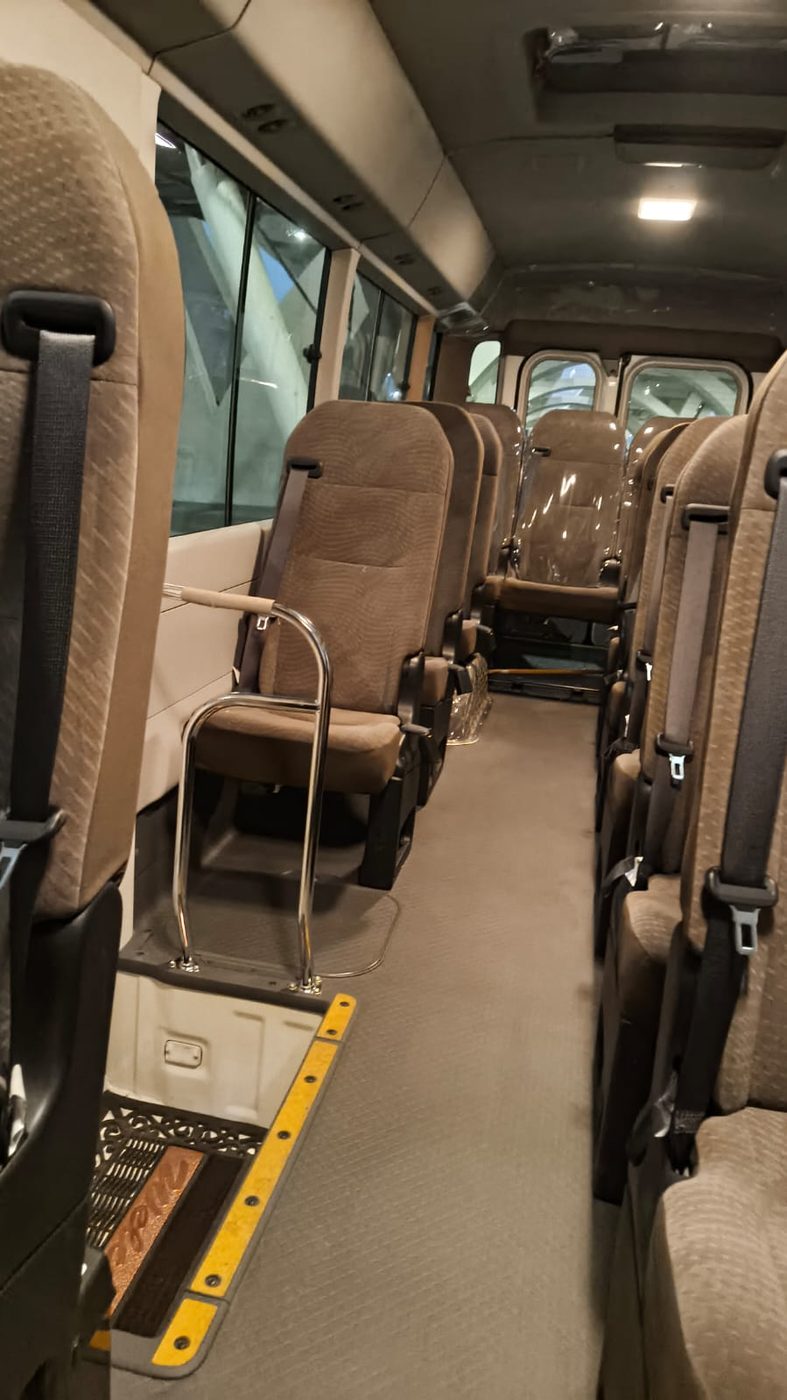 Comfortable interior seating of the Toyota Coaster group coach