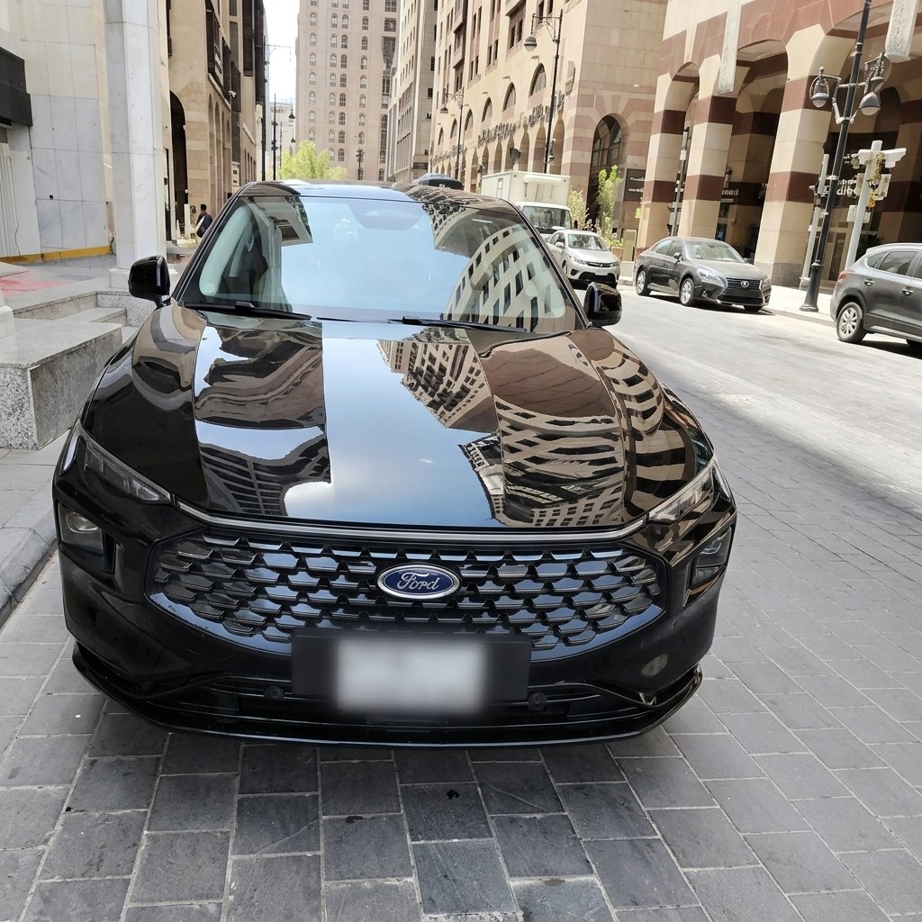Ford Taurus sedan for private Umrah transfers in Saudi Arabia