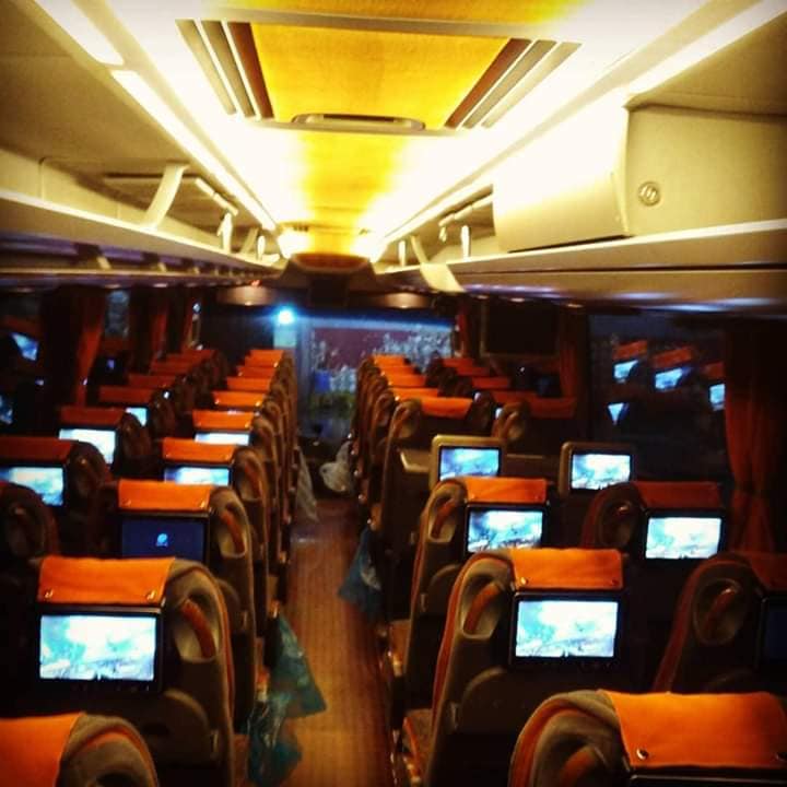 Interior of the Mercedes-Benz Travego coach with reclining seats and seat-back screens